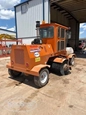 Used Broce Broom in yard